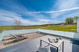 Dachterrasse mir Ausblick auf Golfplatz